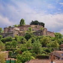 Camping Les Routes de Provence Mane, Forcalquier, Alpes de Haute Provence, France: landscape of the village with the ancient Citadelle, medieval castle on the hill top