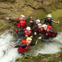 Camping Les Routes de Provence Group Of Active Young People During A Canyoning Expedition In Ecuadorian Rainforest